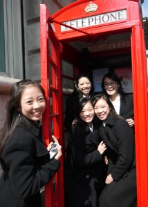 Our dancers enjoyed a "touristy" moment jumping into this phone booth. (Annie Li)