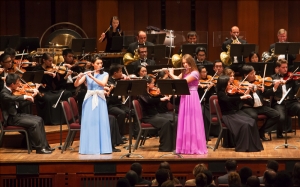 Chia-jung Lee (left) and Lana Kuscer perform A.B. F&uuml;rstenau's Rondo Brillant for two flutes and orchestra, Op.102. The concert also included Shen Yun's vocal soloists, extremely rare in their ability to use bel canto technique to sing Chinese lyrics. Here, tenor Tian Ge performs 'Hope of Returning Home.'