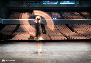 Still in Asia, dancer Daniella Wollensak of Shen Yun World Company practices her fan shen technique.  (photo by dancer Stephanie Guo)