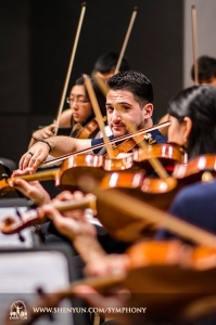 Principal violinist Stepan Khalatyan is the only one cooperating with the cameraman during this rehearsal at the Taichung Chung Hsing Hall, Taiwan.
