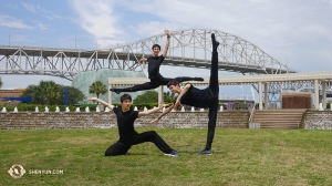 ...Shen Yun North America Company, performing in Texas. Dancers (from left) Louis Liu, Kelvin Diao, and Leo Yin at the Water Gardens outside the Selena Auditorium in Corpus Christi. (Photo by dancer Daren Chou)