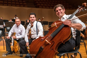 At Goyang, the second South Korean city on tour, principal violist Vardan Petrosyan, principal violinist Stepan Khalatyan, and principal cellist Jake Fowler pose before a performance.  (Photo by TK Kuo)