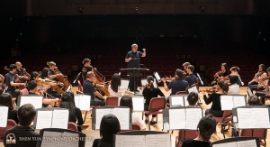 Conductor Milen Nachev readies the orchestra for their final performance in Taiwan.