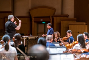 Tenor Tian Ge and the symphony test out acoustics at Hsinchu Performing Arts Center.