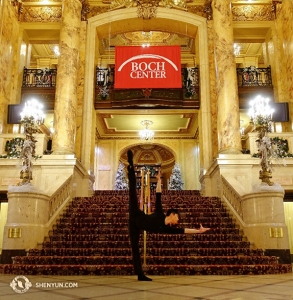 Dancer Joe Huang uses the open space of the theater lobby to practice. (Photo taken by Leo Yin)