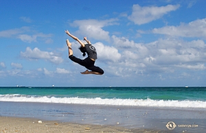 Dancer Hazel Yu leaping at the beach. (Photo by projectionist Regina Dong)
