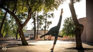 Dancers from the Shen Yun New York Company had some fun outside of the Tucson Music Hall. They've been to so many different places this tour that they feel pretty upside down sometimes. (Photo by Principal Dancer Kenji Kobayashi)
