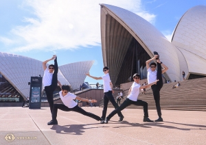 Dancers pose in front of the series of shell-like panels that make up the roof of the Sydney Opera House. The building took 14 years to construct! (Photo by dancer Nick Zhao)
