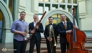 Shen Yun orchestra members gather in front of the California Center for the Arts in Escondido. From left to right, we have Principal Trumpet Vladimir Zemtsov, Principal Bassoon Aleksander Velichko, Principal Trombone Pavlo Baishev and Principal Double Bass Juraj Kukan. (Photo by percussionist Tiffany Yu)