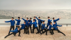 On an overcast day, the company took a trip to Jerusalem and posted at the lookout over the city from the Mount of Olives.
