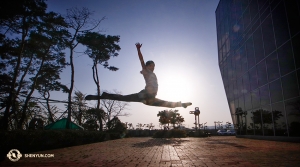 Meanwhile, outside the Ulsan Culture Art Center, dancer Scott Xu also does some stretching of his own. (Photo by dancer Nick Zhao) 