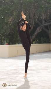 Dancer Liz Lu stretches outside of the Bridges Auditorium in Claremont, California. (Photo by dancer Stephanie Guo)