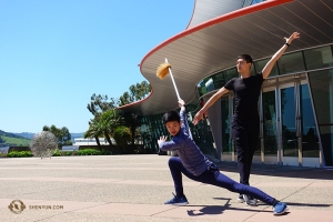 Dancers Leo Yin and Bill Xiong get into character before one of two shows in San Luis Obispo. (Photo by Jeff Chuang)