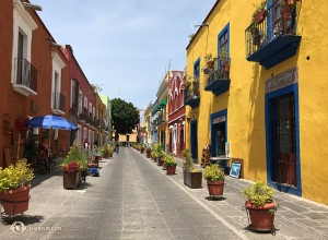 Gli edifici dipinti con colori accesi del centro storico di Pubela si abbinano alla vivacità della propria cultura (foto del pianista Peijong Hsieh)