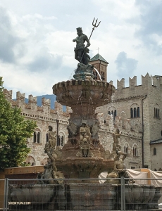 In the center of the Piazza del Duomo, in Italy, the Fountain of Neptune stands. The Roman god of the sea, with his trident, watches over the bustling activity of Trento's main square.
