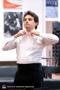 Timpanist Brian Marple spiffing up before the Carnegie concert.