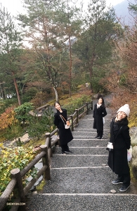 On the way back, dancers (from left) Liz Lu, Justina Wang, and Hazel Yu decide to take a shortcut through the Sogenchi Garden. (Photo by Betty Wang)
