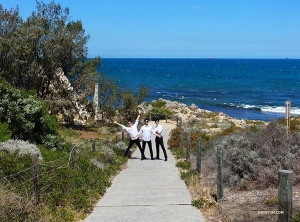 Dancers (from left) Ben Chen, Jungsu Lee, and Suzuki Rui making their way to the sandy shore.