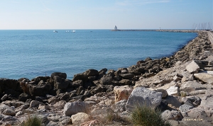 In Montpellier, France, performers from Shen Yun International Company take a stroll along a rocky waterfront between performances at Le Corum. (Photo by Kexin Li)