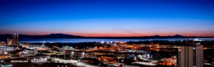 An evening view of Anchorage, with the tallest mountain peak in North America, Denali, on the right. For the Alaskan debut, Shen Yun performed four shows at Anchorage’s Atwood Concert Hall. (Photo by TK Kuo)
