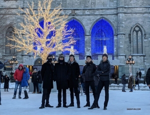 Dressed for the weather, dancers pose together in front of the well-known church located in the historic district of Old Montreal.

(Photo by dancer Ben Chen) 