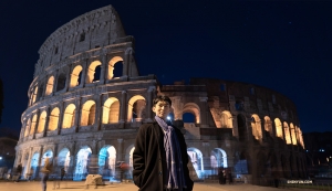 Exploring Rome by moonlight, dancer Kim Jisung takes a moment to pose in front of the Colosseum.

(Photo by Andrew Fung) 