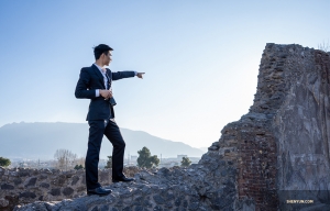 Dancer Eric Lam points the way in Pompeii.

(Photo by William Li)