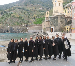 Ladies line up on the shore of Manarola, where an old church bell tower was used to warn of potential pirate raids back in the day. (Photo by dancer Diana Teng)