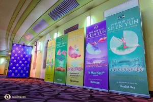 The performers are greeted by a rainbow of previous year's Shen Yun banners alongside this year's design, at the Eventim Apollo.

(Photo by Jeff Chuang)