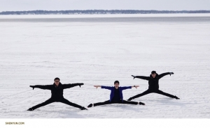 Performers check out how frozen Clear Lake is while stopping for lunch on their way from Minnesota to Nebraska.

(Photo by dancer Jack Han)