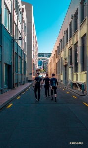 Dancers explore downtown Auckland on foot.

(Photo by Monty Mou)
