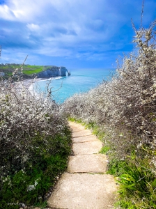 Principal dancer Kenji Kobayashi discovers a narrow pathway leading down to the beach.