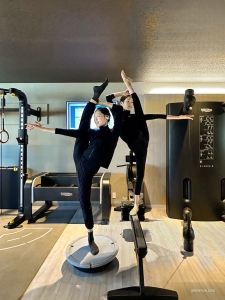 But great leaps and breathtaking technique don't come overnight; they're the result of years of dedicated practice. On a day off, dancers hone their balance and flexibility in the gym.